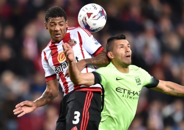 Patrick van Aanholt battles with Sergio Aguero