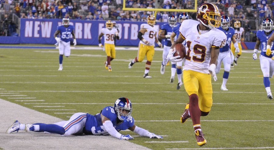 Washington Redskins&#39 Rashad Ross breaks a tackle by New York Giants&#39 Trumaine Mc Bride on a kick return for a touchdown during the second half an NFL football game against the New York Giants Thursday Sept. 24 2015 in East Rutherford