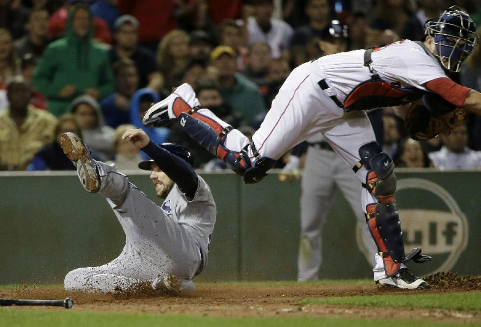 Associated Press Tampa Bay Rays’ Steven Souza Jr. is out at home on a double play as Boston Red Sox catcher Blake Swihart throws to first during the seventh inning Tuesday in Boston