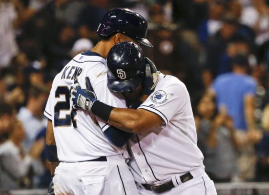 San Diego Padres Yangervis Solarte gets a hug