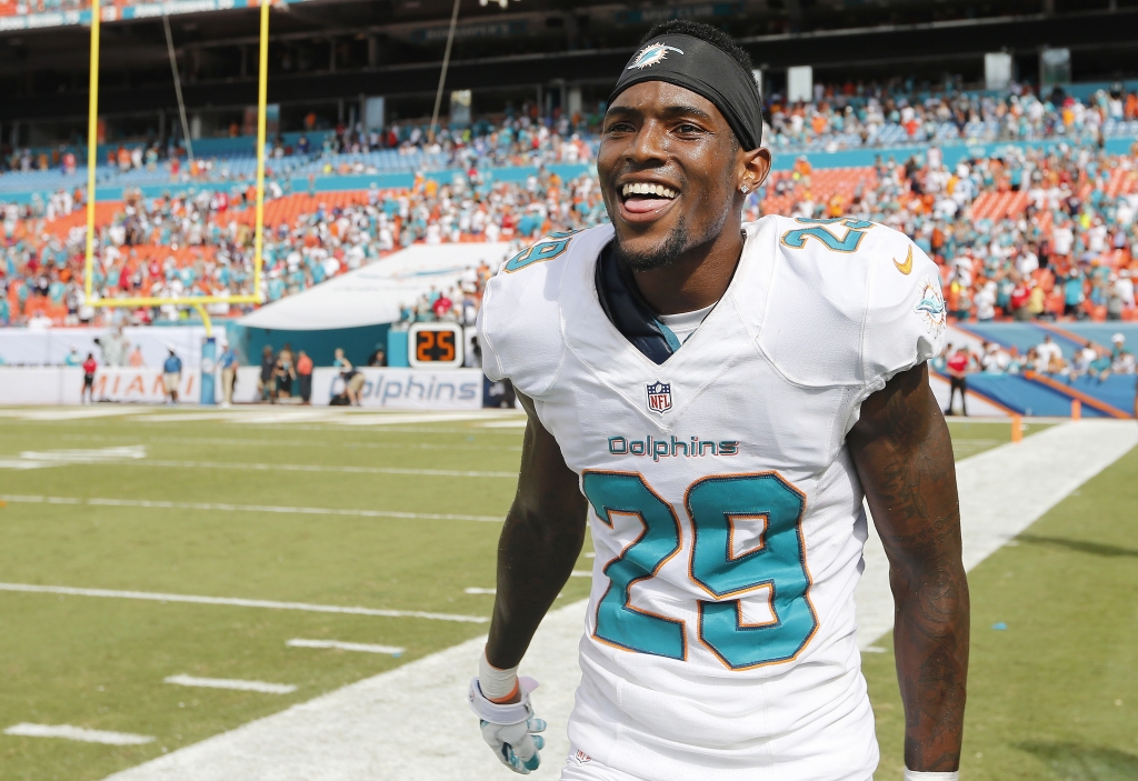 Will Davis #29 of the Miami Dolphins reacts as he leaves the field after the Dolphins defeated the New England Patriots 33-20 in a game at Sun Life Stadium