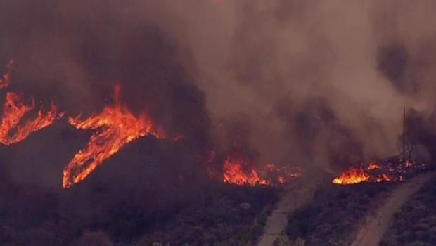 Dozens of homes near Fullerton California were evacuated as a brushfire approached Tuesday