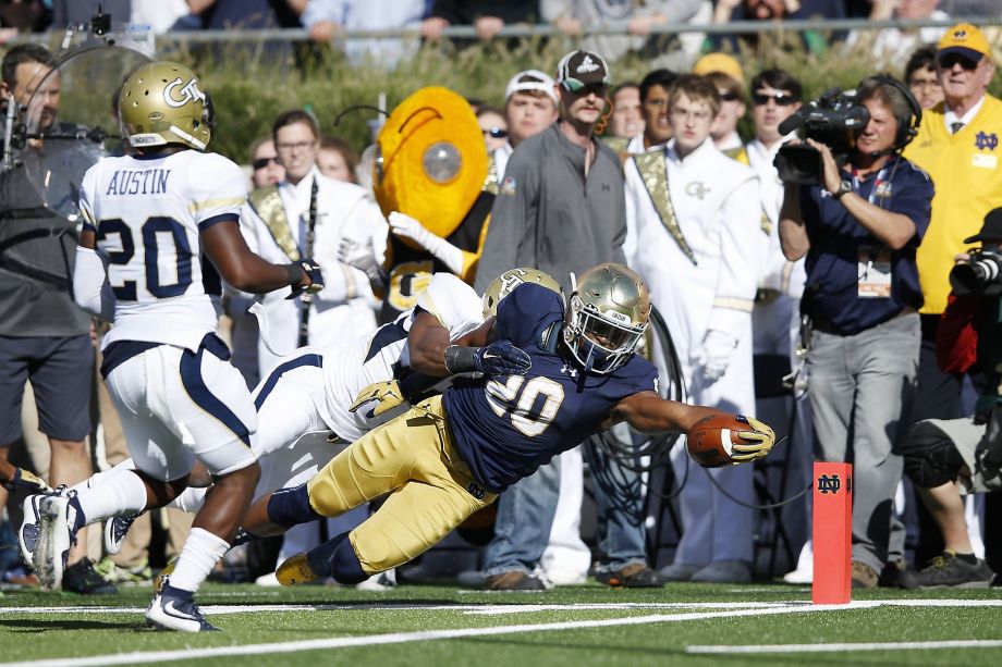 Notre Dame’s C.J. Prosise dives into the end zone for a 17-yard touchdown against Georgia Tech in the second quarter