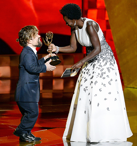 Peter Dinklage accepts his award at the Emmys with a manbun