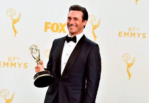 Jon Hamm with the award for outstanding lead actor in a drama series for Mad Men poses in the press room at the 67th Primetime Emmy Awards on Sunday Sept. 20 2015 at the Microsoft Theater in Los Angeles