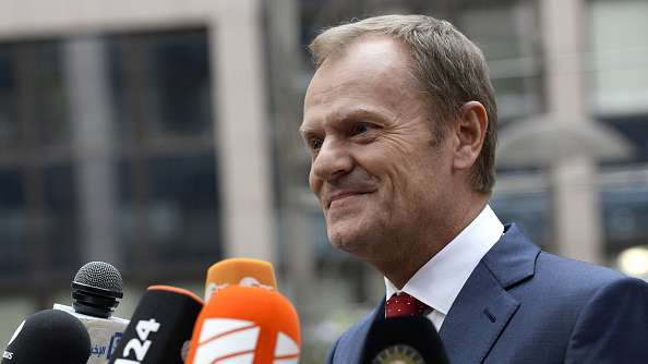 European Council President Donald Tusk talks to the press as he arrives to chair the emergency summit  THIERRY CHARLIER  AFP  Getty Images