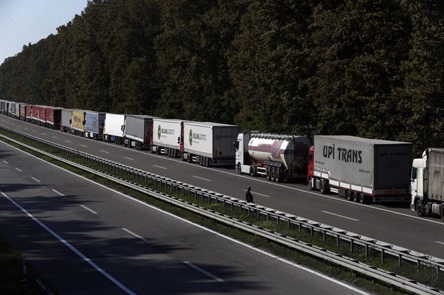 A long queue of vehicles waits on the E-70 motorway near the border between Serbia and Croatia near Batrovci about 100 km west from Belgrade Serbia Tuesday Sept. 22 2015. Serbia's prime minister Aleksandar Vucic said Tuesday that Croatia's closu