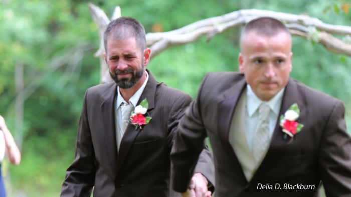 PICS: Father of the bride invites daughter's stepdad to walk down the aisle