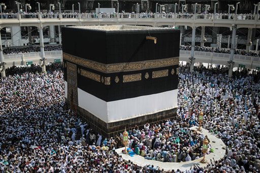 Muslim pilgrims circle the Kaaba the cubic building at the Grand Mosque in the Muslim holy city of Mecca Saudi Arabia Tuesday Sept. 15 2015. Despite the crane accident on Friday almost one million pilgrims have arrived as of Tuesday ahead of the haj