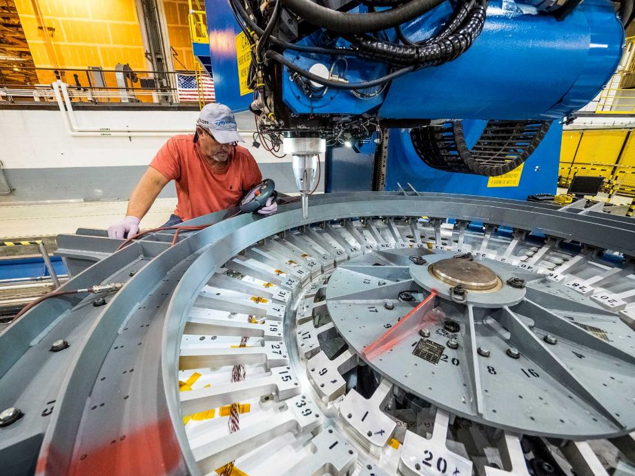 NASA Lockheed Martin engineers at NASA's Michoud Assembly Facility in New Orleans La. perform the first weld on the Orion spacecraft pressure vessel for Exploration Mission-1. This is the third pres