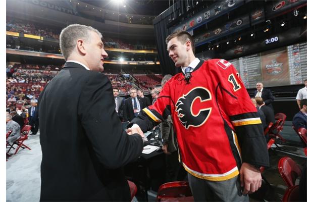 Hunter Smith meets his team after being selected #54 by the Calgary Flames on Day Two of the 2014 NHL Draft at the Wells Fargo Center