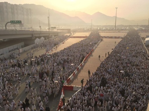 Muslim pilgrims arrive to throw pebbles at pillars during the'Jamarat ritual the stoning of Satan in Mina near the holy city of Mecca on Thursday