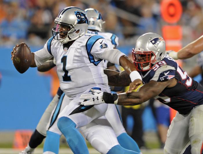 Carolina Panthers&apos Cam Newton is sacked by New England Patriots&apos Dominique Easley during the first half of a preseason NFL football game in Charlotte N.C. Friday Aug. 28 2015