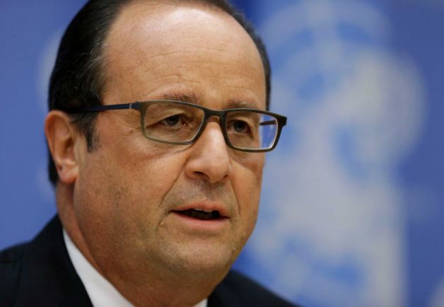 French President Francois Hollande speaks at a news conference at U.N. headquarters Sunday Sept. 27 2015. President Hollande says six French jet fighters targeted and destroyed an Islamic State training camp in eastern Syria