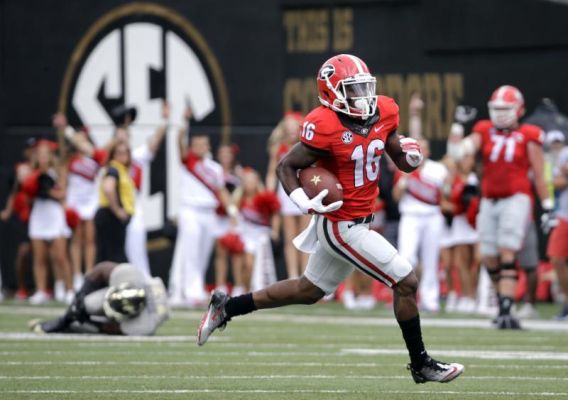 Georgia's Isaiah Mc Kenzie returns a punt 77