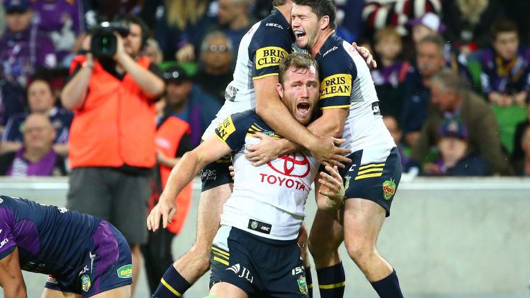 Gavin Cooper celebrates one of his two tries for North Queensland Cowboys against Melbourne Storm