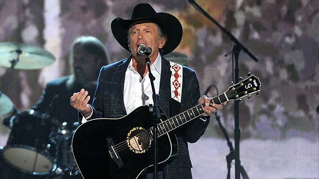 George Strait performs on stage at the 49th annual Academy of Country Music Awards at the MGM Grand Garden Arena on Sunday