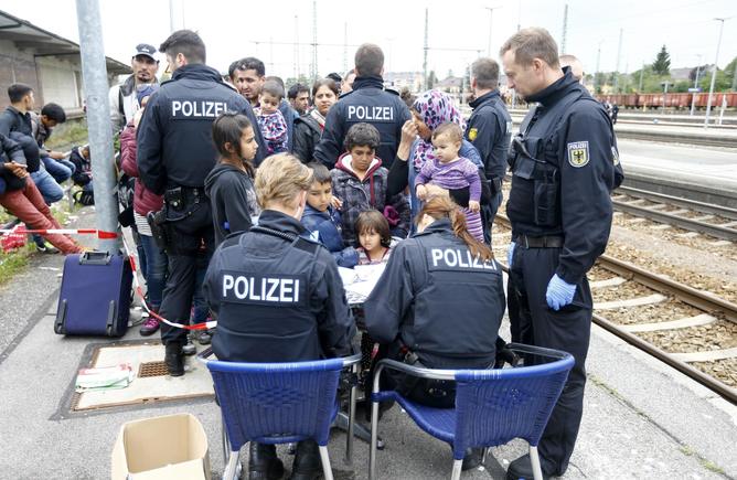 German police register migrants at a border station in Freilassing.    Reuters  Dominic Ebenbichler