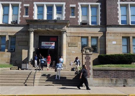 A 16-year-old girl poured gasoline on two Pennsylvania high school security guards and unsuccessfully tried to ignite it using a grill lighter police said Tuesday in announcing charges against the girl