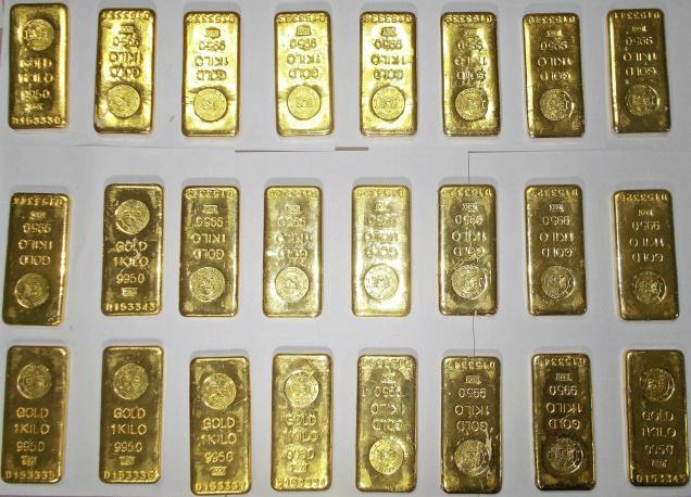 Seized gold bars are kept on display by customs officers at the international airport in Kolkata in this