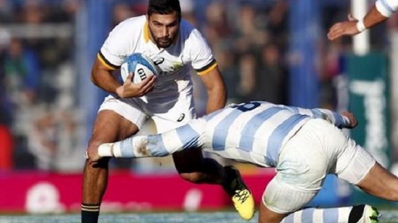 South Africa's Damian de Allende is tackled by Argentina's Juan Manuel Leguizamon during their rugby union test match in Buenos Aires