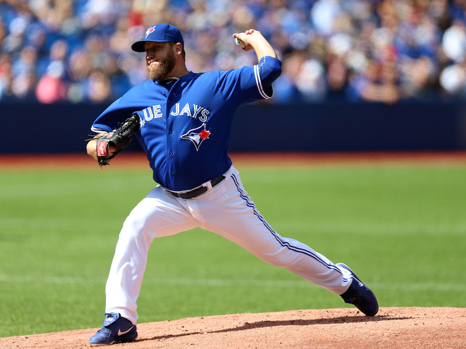 Toronto Blue Jays starter Mark Buehrle pitches in the first inning agasinst the Red Sox. Buehrle allowed three runs in six innings