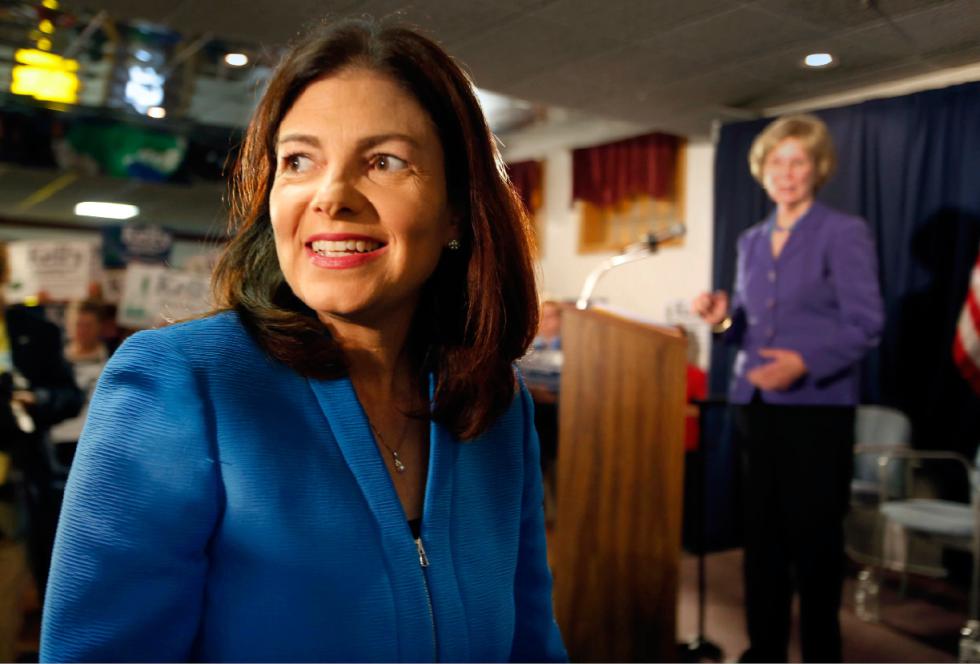 Former Speaker of the House donna Sytek right watches as Sen. Kelly Ayotte R-N.H. arrives and where she announced her plans to seek a second term Tuesday