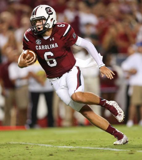 South Carolina quarterback Connor Mitch runs for a touchdown in the first half of an NCAA college football game against Kentucky Saturday Sept. 12 2015 in Columbia S.C