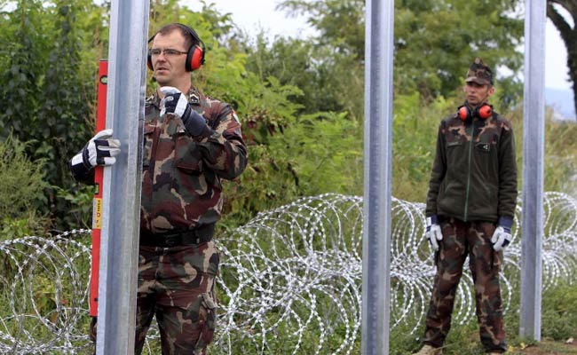 PM Mobilises Hungary's Troops Prisoners Jobless to Fence out Migrants