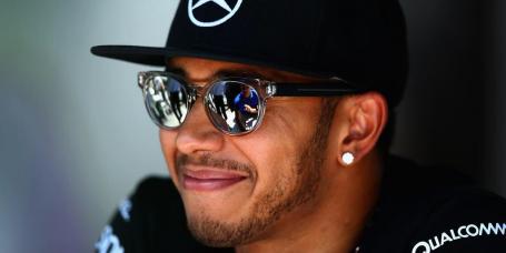 Image Text
 CONFIDENT World champion Lewis Hamilton