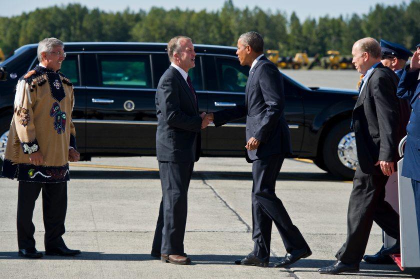 Sen. Dan Sullivan greets President Barack Obama and Gov. Bill Walker as they disembark from Air Force One. Lt. Gov. Byron Mallott waits on the left