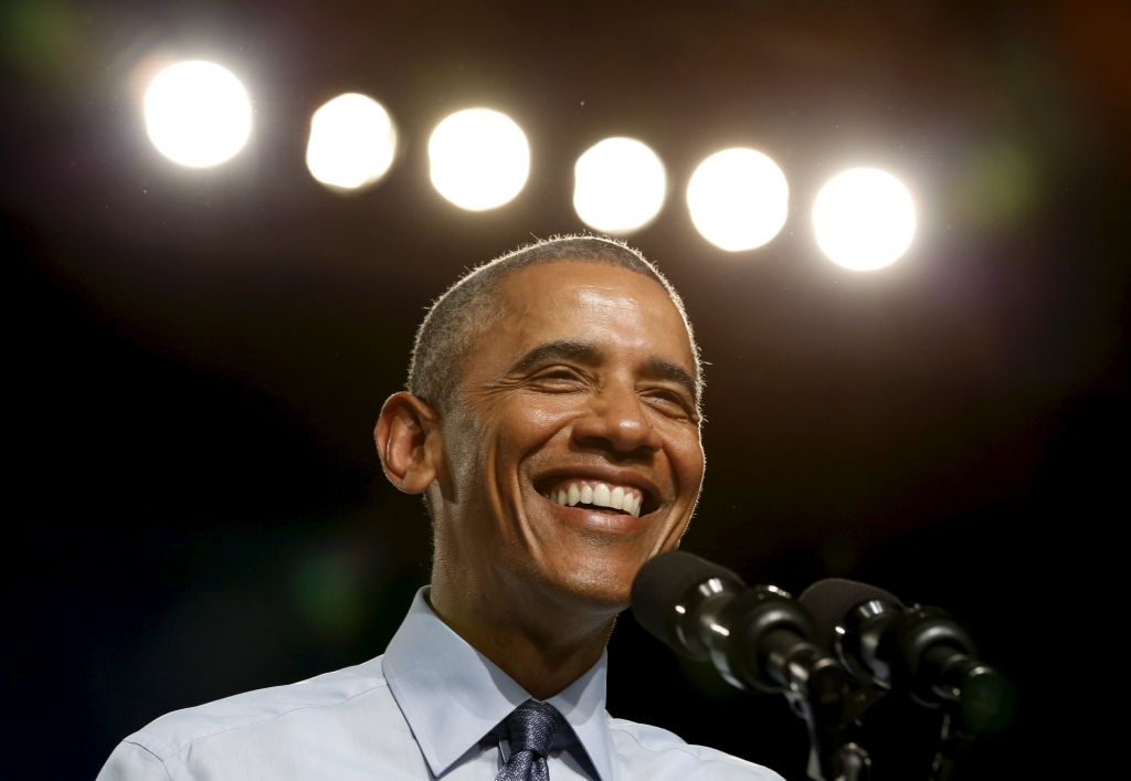 U.S. President Barack Obama smiles while speaking during a visit to Macomb Community College in Warren