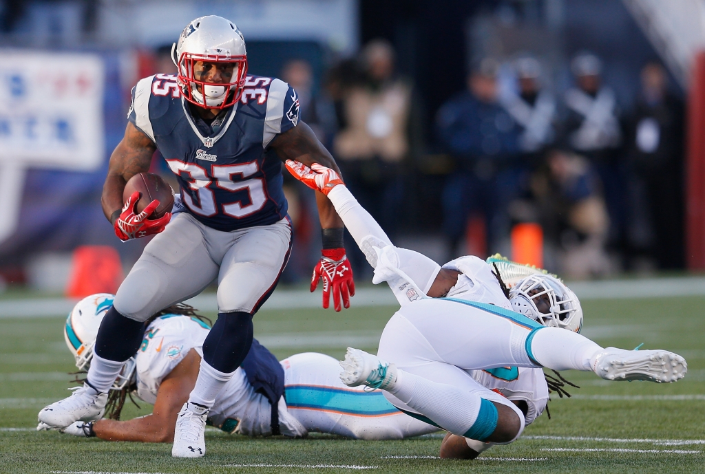 Jonas Gray #35 of the New England Patriots carries the ball during the third quarter against the Miami Dolphins at Gillette Stadium