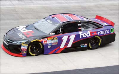 Forgoing a last minute tire change earned Denny Hamlin a.963 second victory over Carl Edwards in the opening Chase for the NASCR Sprint Cut race at Chicagoland Speedway Sunday