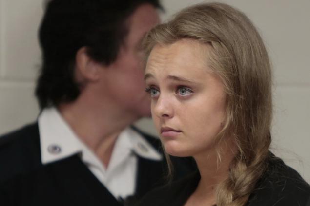 Michelle Carter 18 listens on Aug. 24 as her attorney argues for her indictment for the involuntary manslaughter charge in the July 2014 death of her online boyfriend Conrad Roy to be dismissed at New Bedford Juvenile Court