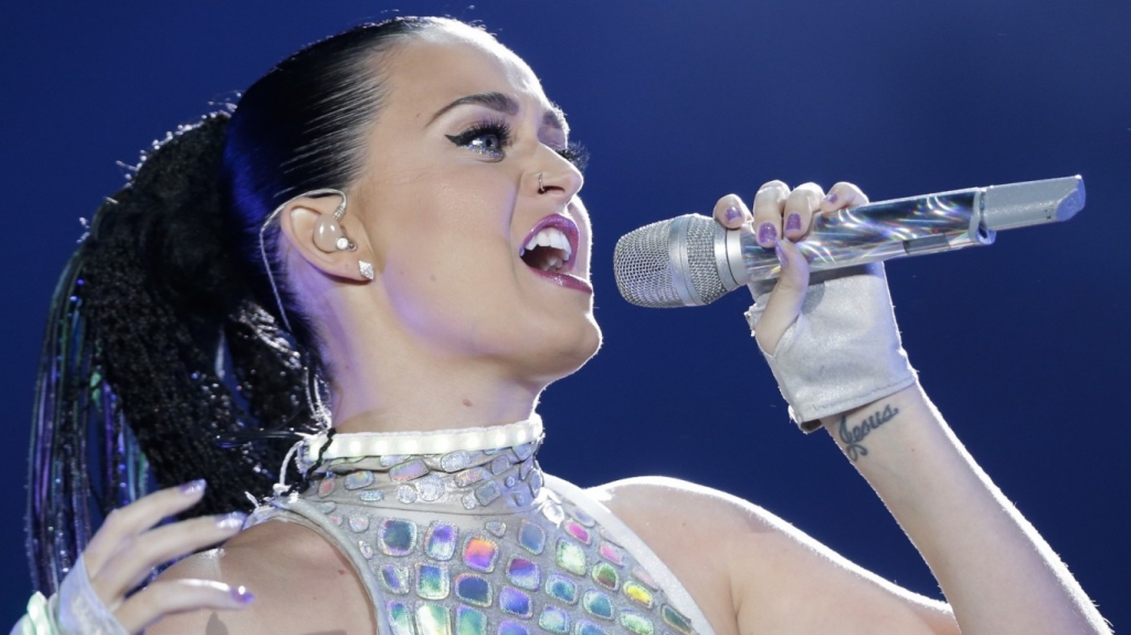 Katy Perry is a good sport as she gets groped by overzealous fan on stage