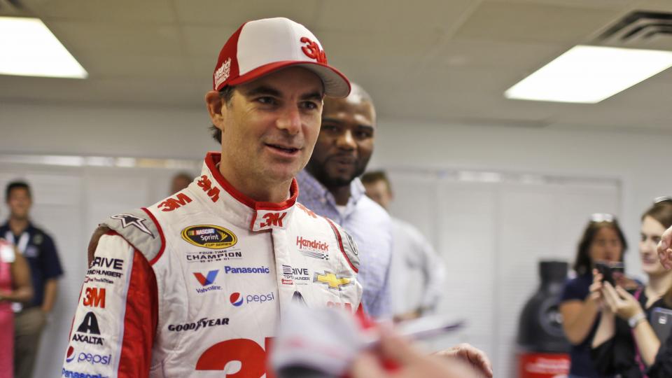 Driver Jeff Gordon gets ready to sign autographs after practice for the NASCAR Sprint Cup auto race at Richmond International Raceway in Richmond Va. Friday Sept. 11 2015