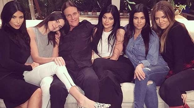 Bruce Jenner flanked by daughters Kendall centre left and Kylie centre right as well as his step-daughters from left to right Kim Kourtney and Khloe some of whom are releasing apps