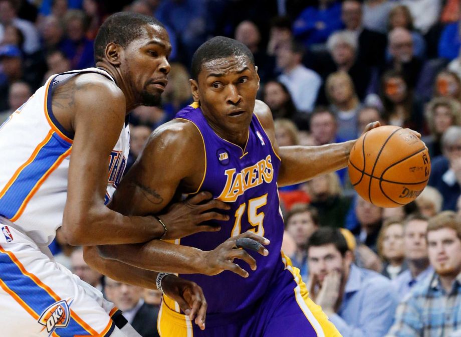 Los Angeles Lakers forward Metta World Peace drives around Oklahoma City Thunder forward Kevin Durant during an NBA basketball game in Oklahoma City. The Los Angeles Lakers have re-signed forward Metta World