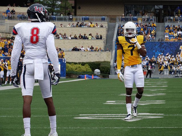 Liberty WR Dante’ Shells lining up against WVU’s Daryl Worley