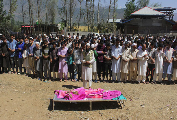 Locals gather to mourn the death of three-year-old Burhan Bashir Bhat who was killed in a recent spate of firing in North kashmir