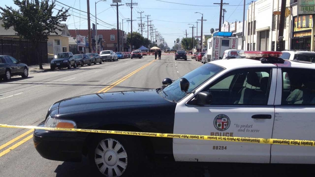 Los Angeles police investigate a fatal officer-involved shooting near E. 22nd and S. San Pedro streets in South Los Angeles on Sunday Sept. 27 2015