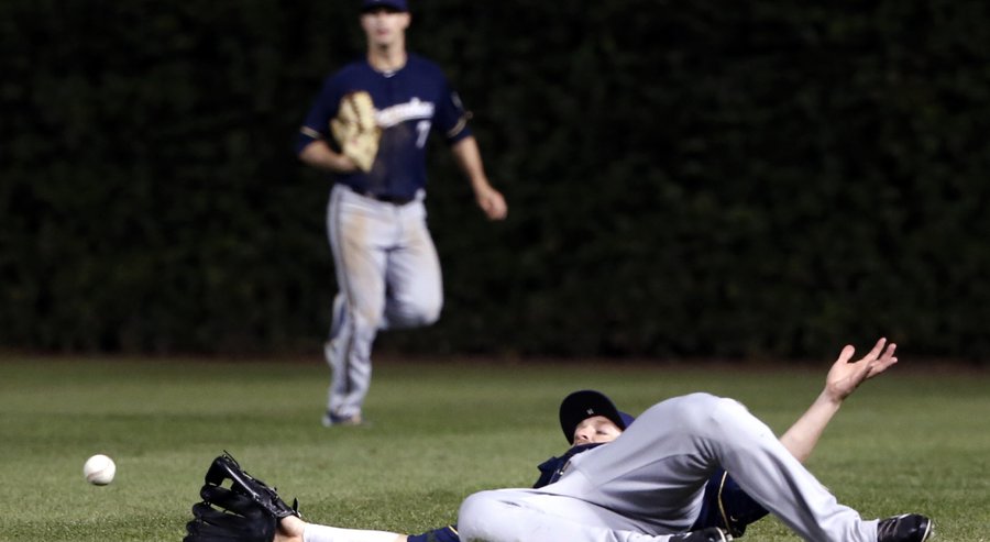 Milwaukee Brewers right fielder Shane Peterson is unable to catch a shallow fly ball from Chicago Cubs&#39 Starlin Castro during the seventh inning of a baseball game Monday Sept. 21 2015 in Chicago