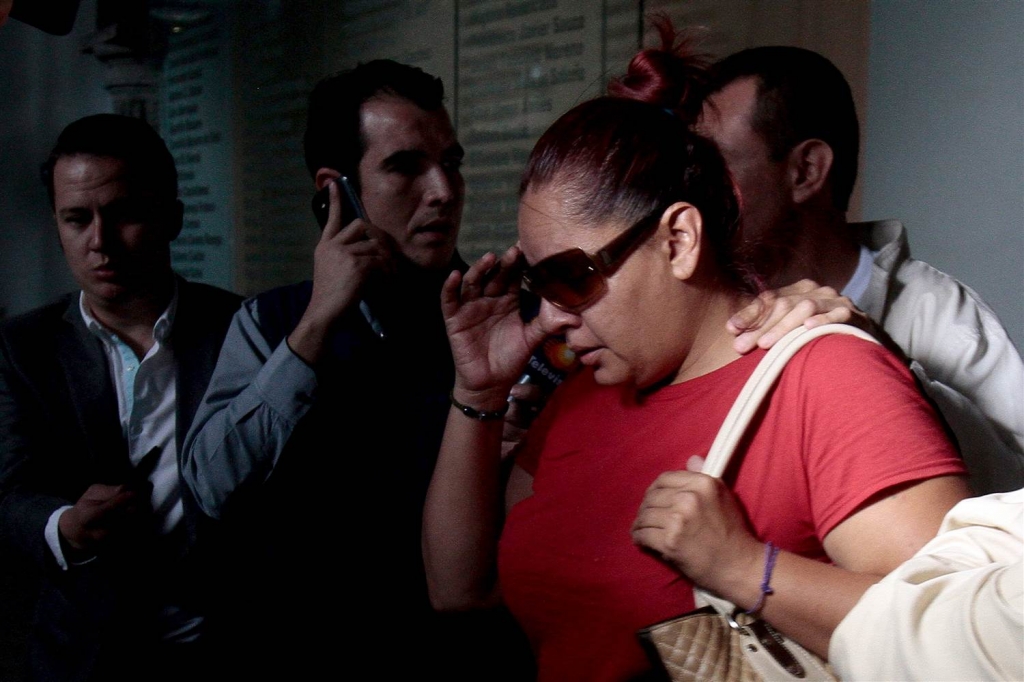 Image Gabriela Bejarano sister of Rafael one of the eight Mexicans killed in an incident in Egypt leaves the Government Palace after a meeting with local officials in Guadalajara