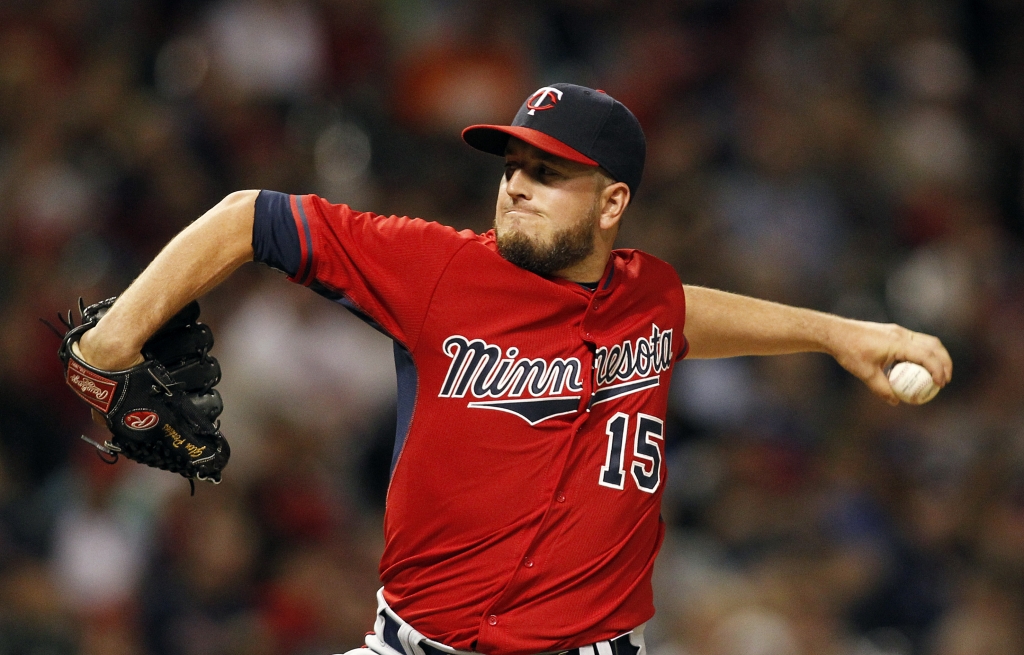 Minnesota Twins&#039 Glen Perkins pitches in the ninth inning of a baseball game against the Cleveland Indians Friday Aug. 7 2015 in Cleveland. (AP