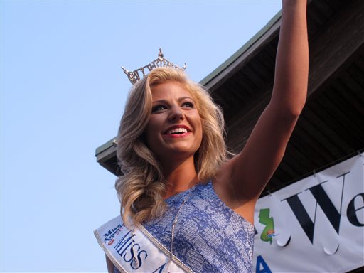 Miss Alabama Meg Mc Guffin waves to spectators at the traditional Miss America welcome ceremony on the Atlantic City Boardwalk on Tuesday Sept. 1 2015. The new Miss America will be crowned in Atlantic City's Boardwalk Hall on Sept. 13. (AP