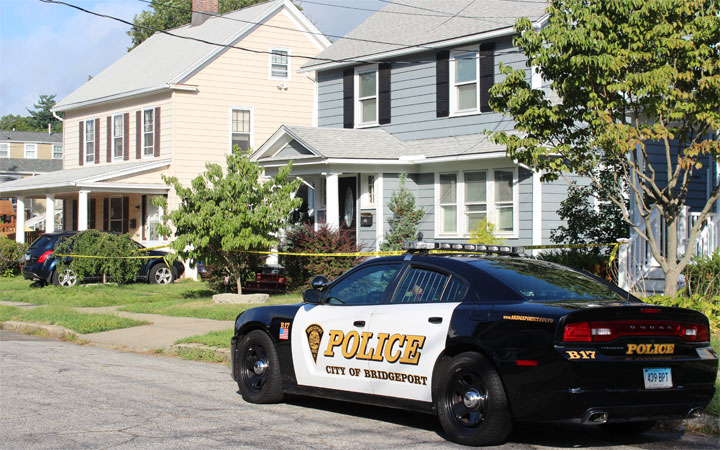 Yellow police tape surrounds a house in Bridgeport owned by Kyle Navin the son of missing Easton couple Jeffrey and Jeanette Navin. — John Kovach HAN Network