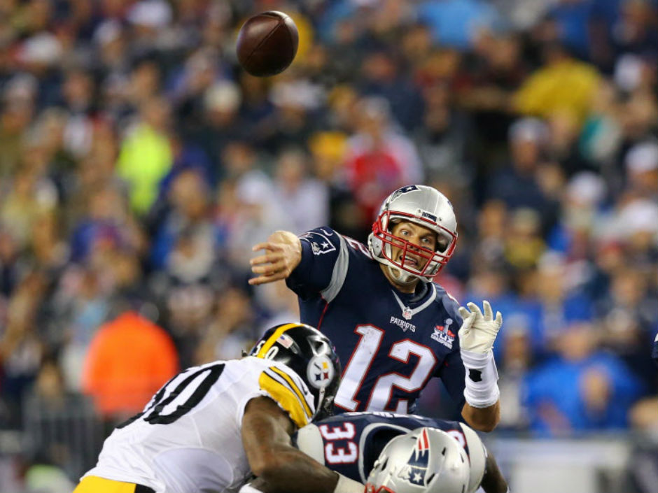 With Deflategate behind him Tom Brady returned to his old ways Thursday night tossing four touchdown passes as the New England Patriots beat the Pittsburgh Steelers 28-21 in the NFL season-opener