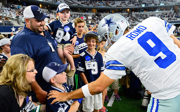 Dallas Cowboys have today been named as sports biggest franchise. Pictuerd quarterback Tony Romo talks to a fans before his teams game against the New York Giants at AT&T Stadium in Arlington Texas