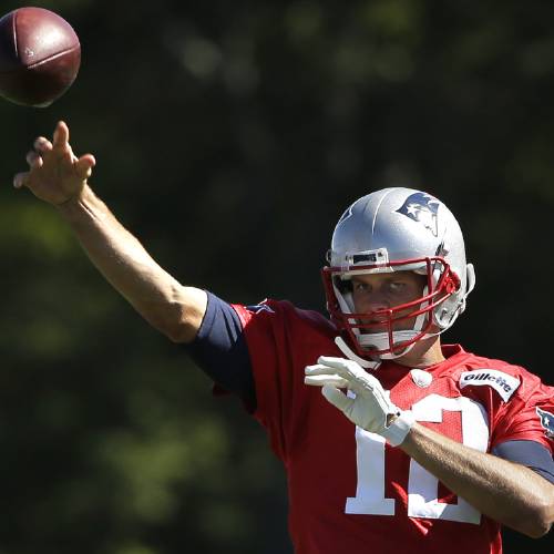 Patriots quarterback Tom Brady throws a pass during NFL football practice Wednesday Sept. 23 2015 in Foxborough Mass